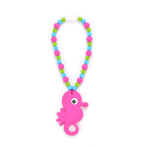 Nummy Beads Magenta Seahorse Baby Carrier Teether Toy